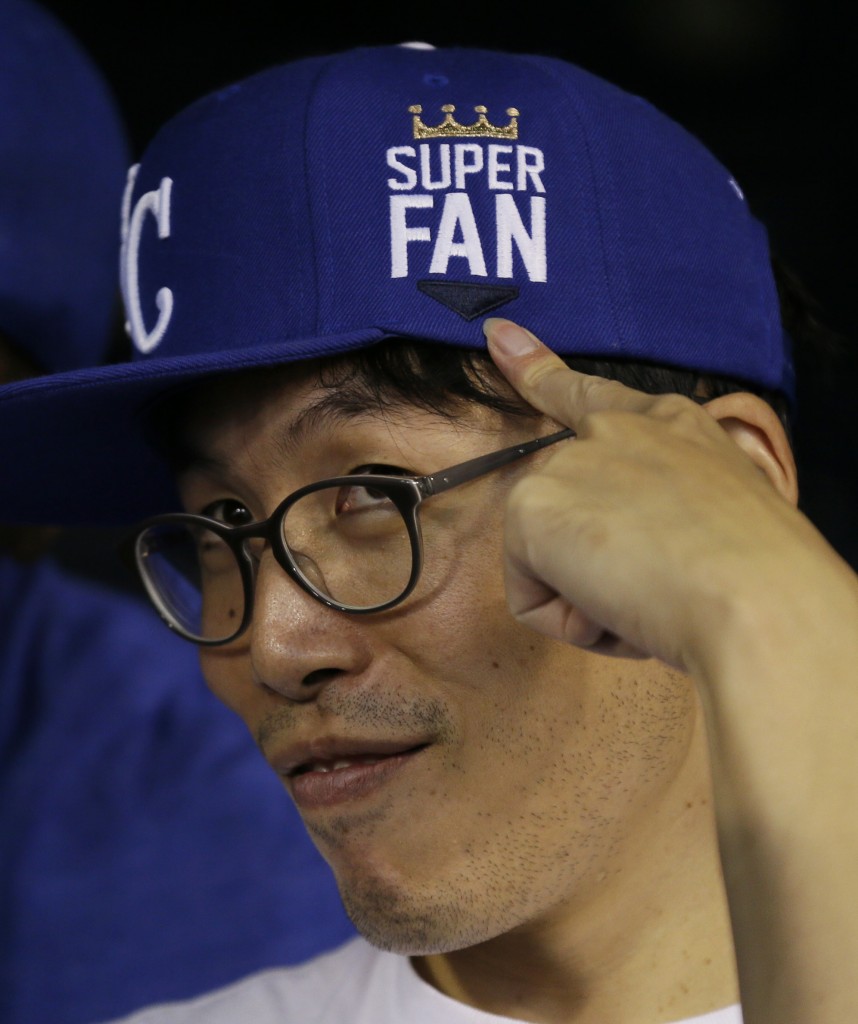 Kansas City Royals fan Sung Woo Lee, from South Korea, shows off his "super fan' cap. (AP) 