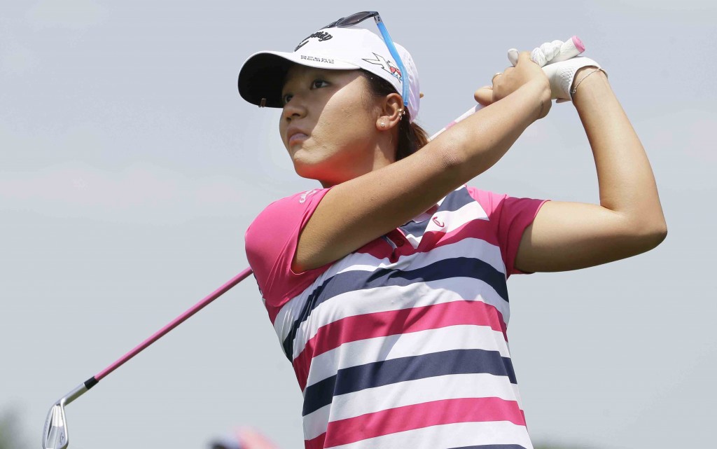 Lydia Ko watches her tee shot then the 11th hole during the second round of the LPGA North Texas Shootout golf tournament, Friday, May 1, 2015, in Irving, Texas. (AP Photo/LM Otero)