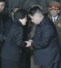 In this Dec. 26, 2011 image made from APTN video, Kim Jong Un, right, late North Korean leader Kim Jong Il's youngest known son and successor, shakes hands with Lee Hee-ho, the wife of former South Korean President Kim Dae-jung who visits Kumsusan Memorial Palace to pay respects to the late leader in Pyongyang, North Korea. (AP Photo/APTN)