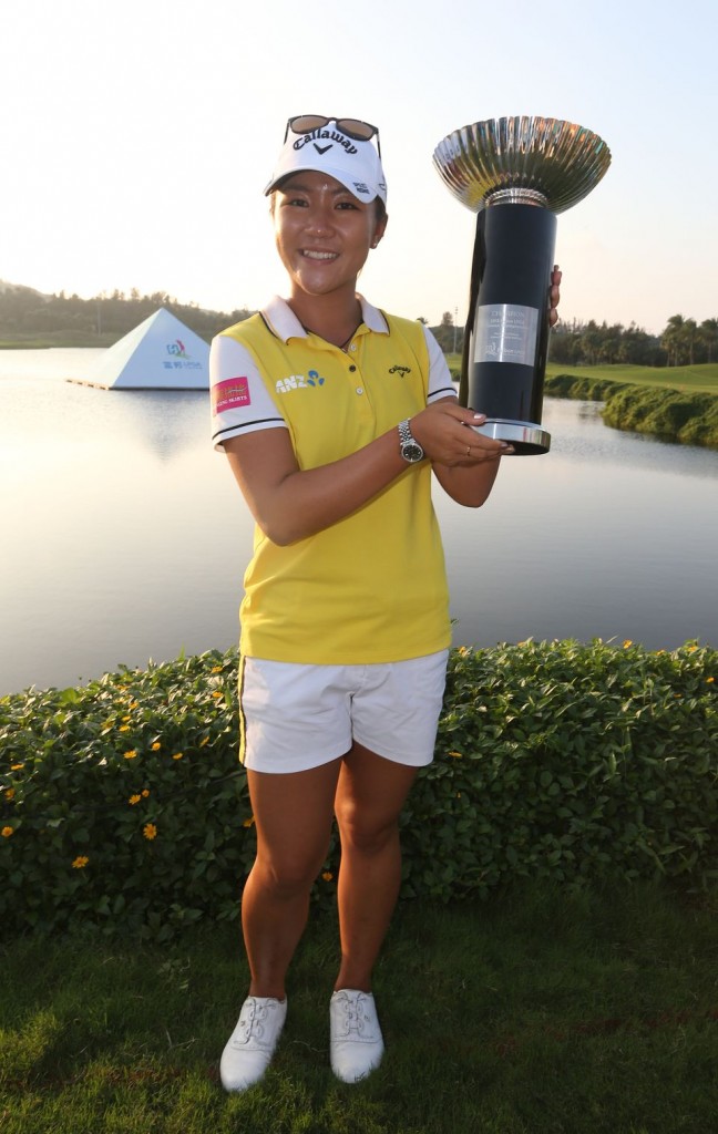 Lydia Ko of New Zealand displays her trophy after winning the LPGA Taiwan Championship at the Miramar Golf Country Club in Taipei county, Taiwan, Sunday, Oct. 25, 2015. (AP Photo)