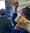 FILE - In this Jan. 13, 2016 file photo, customers wait to buy lottery tickets at the Blue Bird liguor store in Hawthorne, Calif. With hours to go and $63 million on the line, the mystery remains: Wheres the winning California Lottery ticket - the one sold last Aug. 8, that is - and why hasnt somebody cashed it? Whatever the reason, it wont be a good enough excuse if the 5 p.m. Thursday, Feb. 4, 2016 deadline passes and nobody produces the ticket at a lottery office. The ticket was sold at a 7-Eleven store in the Chatsworth neighborhood of Los Angeles.(AP Photo/Damian Dovarganes, File)