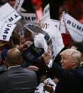 Republican presidential candidate Donald Trump greets supporters after a rally Thursday, April 28, 2016, in Costa Mesa, Calif.