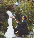 A wedding photo of actress Park Soo-jin and actor Bae Yong-joon.