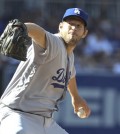 Los Angeles Dodgers starting pitcher Clayton Kershaw works against the San Diego Padres during the first inning of a baseball game Monday, April 4, 2016, in San Diego.