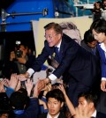 South Korea’s president-elect, Moon Jae-in, and the Democratic Party of Korea’s leader, Choo Mi-ae, greeting supporters at Gwanghwamun Square in Seoul. Credit Kim Kyung-Hoon/Reuters