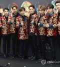 Members of K-pop band EXO pose for the camera during a press conference at the Jamsil Olympic Main Stadium in Seoul on May 28, 2017. (Yonhap)