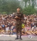 In this photo released by Label SJ, Eunhyuk, a member of the K-pop boy group Super Junior, speaks in front of a military unit in Wonju, east of Seoul, on July 12, 2017, after being discharged from military service. (Yonhap)