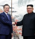 South Korean President Moon Jae-in (L) and North Korean leader Kim Jong-un shake hands after holding a joint press conference in Pyongyang on Sept. 19, 2018, to announce the outcome of their bilateral summit that began the previous day. (Joint Press Corps-Yonhap)