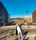 This image captured from BTS's official Twitter account on Oct. 16, 2018, shows a masked band member posing in front of the Mercedes-Benz Arena in Berlin, Germany. (Yonhap)