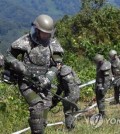 South Korean troops engage in demining operations inside the Demilitarized Zone on Oct. 2, 2018, in this photo provided by the Joint Press Corps. (Yonhap)