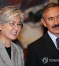 South Korean Foreign Minister Kang Kyung-wha (L) and U.S. Ambassador to Seoul Harry Harris attend a ceremony to sign a deal on renewing the WEST program in Seoul on Oct. 22, 2018. (Yonhap)