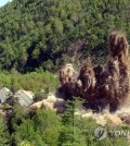 This photo, provided by North Korea's state news agency on May 25, 2018, shows North Korea's demolition of its Punggye-ri nuclear test site on the northeast. (For Use Only in the Republic of Korea No Redistribution) (Yonhap)