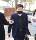 Former Yongsan Police Station chief Lee Im-jae (C) appears for questioning at the special police investigation team's office in western Seoul, in this file photo taken Nov. 24, 2022. (Yonhap)