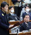 Lawmakers from the ruling and opposition parties strongly chided senior police officials over the Itaewon crowd crush Wednesday as a special parliamentary committee investigating the tragedy held its first hearing. The committee summoned National Police Agency Commissioner General Yoon Hee-keun, Seoul Metropolitan Police Agency (SMPA) chief Kim Kwang-ho, former Yongsan Police Station chief Lee Im-jae, Yongsan Fire Station chief Choi Seong-beom and others as witnesses for the first hearing. The ruling People Power Party (PPP) focused its attack on the Yongsan Police Station chief. "The authorities failed to predict overcrowding, the reporting system was not swift enough, and rescue efforts were not properly made on site," Rep. Jun Joo-hyae said. "The fault lays with many people, but if we have to pick one, it would be Lee Im-jae who was the chief of the Yongsan Police Station at the time." Rep. Cho Su-jin pointed out that it took an hour for Lee to arrive at the scene because he took a car to get there, though it would have taken only 10 minutes if he had walked, claiming that casualties grew because no measures were taken during the wasted time. The main opposition Democratic Party (DP) focused on criticizing the general police response. "People's safety was not the priority for the police," Rep. Cheon Jun-ho said, claiming that police were more focused on cracking down on drug crimes. One of the main issues in the hearing was whether the Yongsan Police Station asked the SMPA to dispatch a police squad for crowd control. Lee, the former Yongsan police chief, claimed he ordered such a request to be made, but the SMPA turned it down. SMPA chief Kim, however, claimed he did not receive such a request. "The SMPA did not receive a request for a police squad other than one for traffic control," Kim said. Lee insisted there was a lot of evidence that he ordered the request to be made. For the second hearing Friday, the committee summoned government officials, including Interior Minister Lee Sang-min and Health Minister Cho Kyoo-hong, as well as Seoul Mayor Oh Se-hoon and Yongsan Ward office chief Park Hee-young. The 45-day investigation into the tragedy is scheduled to finish Saturday, but the rival parties were in discussion to extend the probe amid criticism a proper probe was delayed while the National Assembly dealt with the state budget plan for 2023 first. The DP called for extending the probe by at least 10 days and holding additional hearings, but the PPP has yet to accept the proposal. Seoul Metropolitan Police Agency chief Kim Kwang-ho (2nd from R) answers lawmakers' questions at a parliamentary probe hearing on the Itaewon tragedy held at the National Assembly on Jan. 4, 2023. On the left is former Yongsan Police Station chief Lee Im-jae. (Yonhap)