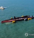 A search is under way in waters off the southwestern island of Daebichi on Feb. 5, 2023, a day after a 24-ton fishing boat overturned, leaving nine people missing. (Yonhap)