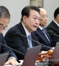 President Yoon Suk Yeol speaks at a Cabinet meeting held at the presidential office in central Seoul on Feb. 21, 2023. (Pool photo) (Yonhap)