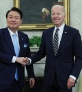 South Korean President Yoon Suk Yeol (L) and U.S. President Joe Biden shake hands during a summit at the White House in Washington on April 26, 2023.REUTERS