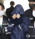 A suspected mastermind of a kidnapping-murder of a woman in southern Seoul attends a court hearing at Seoul Central District Court on April 10, 2023. (Yonhap)