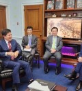 Rep. Kim Tae-ho (second from left), chairman of the parliamentary foreign affairs committee, smiles during a meeting with Congressman Michael McCaul in Washington on June 22, 2023 (local time). (PHOTO NOT FOR SALE) (Yonhap)