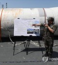 The salvaged wreckage of a North Korean space rocket is displayed on the deck of the ROKS Gwangyang at the Navy's Second Fleet in Pyeongtaek, 60 kilometers south of Seoul, on June 16, 2023. (Pool photo) (Yonhap)