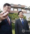 Main opposition Democratic Party leader Lee Jae-myung (R) is seen with Chinese Ambassador to South Korea Xing Haiming at the ambassador's residence in Seoul on June 8, 2023. (Yonhap)