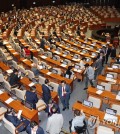 Lawmakers from the ruling People Power Party are seen leaving the National Assembly en masse before a vote on whether to introduce a contentious pro-labor bill, nicknamed the "yellow envelope bill," directly to a plenary session on June 30, 2023. (Yonhap)