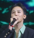 G-Dragon speaks during a promotion event held in Seoul, in this file photo taken March 28, 2023. (Yonhap)