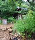 This photo provided by the Cultural Heritage Administration shows soil erosion at the Seoseoldang Historic House in Bonghwa, 183 kilometers southeast of Seoul, due to recent heavy rains. (PHOTO NOT FOR SALE) (Yonhap)