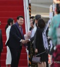 South Korean President Yoon Suk Yeol arrived in Jakarta on Tuesday to attend annual summits involving the Association of Southeast Asian Nations (ASEAN) on the first leg of a two-nation tour that will later take him to India for a summit with leaders of the Group of 20 (G20) major economies. This will be the second consecutive year the president attends both gatherings, underscoring the importance his administration places on boosting cooperation with a region noted for its strategic position in the U.S.-China rivalry and its growing economic potential. Yoon also said in an interview with the Associated Press published Monday that he will use the meetings to urge the international community to "resolutely respond to North Korea's ever-escalating missile provocations and nuclear threats and to work closely together on its denuclearization." South Korean President Yoon Suk Yeol and first lady Kim Keon Hee are greeted by officials upon arrival at Soekarno-Hatta International Airport in Jakarta, Indonesia, on Sept. 5, 2023. (Yonhap) South Korean President Yoon Suk Yeol and first lady Kim Keon Hee are greeted by officials upon arrival at Soekarno-Hatta International Airport in Jakarta, Indonesia, on Sept. 5, 2023. (Yonhap) ASEAN comprises Brunei Darussalam, Cambodia, Indonesia, Laos, Malaysia, Myanmar, the Philippines, Singapore, Thailand and Vietnam. On Wednesday, Yoon will attend a South Korea-ASEAN summit and check the current state of practical cooperation between the two sides while also discussing areas of future cooperation, Principal Deputy National Security Adviser Kim Tae-hyo told reporters last week. The same day he will attend an ASEAN Plus Three summit involving the 10 member states, and South Korea, Japan and China to discuss ways to realize an "East Asian community," before going to a gala dinner hosted by Indonesia, the current ASEAN chair. On Thursday, the president will attend the East Asia Summit, a security forum bringing together leaders from the 10 ASEAN states and eight other countries, including South Korea, the U.S. and China. Kim said Yoon will present South Korea's position on regional and international issues, including North Korea's nuclear program, and explain how the country plans to defend and contribute to the rules-based international order. "President Yoon plans to emphasize the importance we place on ASEAN by personally attending the ASEAN summits for the second consecutive year," Kim said. "In particular, he will state our government's plans to push the Korea-ASEAN Solidarity Initiative (KASI) in earnest by announcing plans to strengthen cooperation in the cyber and maritime security fields, and cooperation projects in the digital innovation field." KASI was unveiled by Yoon during last year's ASEAN summits in Cambodia in November and centers on enhancing strategic communication and cooperation with the bloc's 10 members for regional peace and stability. The initiative also forms a core part of South Korea's Indo-Pacific strategy. South Korean President Yoon Suk Yeol and first lady Kim Keon Hee are greeted by officials upon arrival at Soekarno-Hatta International Airport in Jakarta, Indonesia, on Sept. 5, 2023. (Yonhap) South Korean President Yoon Suk Yeol and first lady Kim Keon Hee are greeted by officials upon arrival at Soekarno-Hatta International Airport in Jakarta, Indonesia, on Sept. 5, 2023. (Yonhap) Yoon's trip to Jakarta will double as a bilateral visit marking the 50th anniversary of diplomatic relations between South Korea and Indonesia. On Friday, he will hold a summit with Indonesian President Joko Widodo at the presidential palace in Jakarta and attend a cooperation agreement signing ceremony, as well as a joint press conference. Later that day, he will travel to New Delhi, India, and attend two sessions of the G20 summit the following day, including one on climate change and the environment. Yoon will present detailed ways South Korea plans to contribute to overcoming climate change. On Sunday, the last day of his tour, Yoon is scheduled to visit the Raj Ghat memorial dedicated to the Indian anti-colonial nationalist Mahatma Gandhi with other world leaders. He will then attend the third G20 session under the theme "One Future" to discuss ways South Korea will contribute to building a free, peaceful and prosperous future. Yoon is set to hold at least 14 bilateral meetings on the sidelines of the ASEAN and G20 summits, including with the leaders of Malaysia, the Philippines, Singapore, Cambodia, India, Spain and Argentina. A bilateral meeting with Chinese President Xi Jinping was raised as a possibility for the India trip, but a presidential official said it is not being planned, as Beijing has not revealed whether Xi will attend the G20 summit. Yoon will return home Monday. He is accompanied on the trip by first lady Kim Keon Hee.