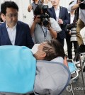 The leader of the main opposition Democratic Party, Lee Jae-myung (C), is transferred to a nearby hospital from the National Assembly in Seoul on Sept. 18, 2023. (Yonhap)