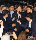 Lee Jae-myung, chair of the main opposition Democratic Party (DP), speaks to the press as he walks out of a detention facility on the outskirts of Seoul on Sept. 27, 2023. (Yonhap)