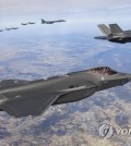 This file photo, provided by Seoul's Joint Chiefs of Staff on Nov. 19, 2022, shows South Korean and U.S. fighter jets staging a combined aerial exercise with a U.S. B-1B strategic bomber over the Korean Peninsula. (PHOTO NOT FOR SALE) (Yonhap)