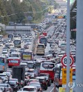 The Gyeongbu Expressway is heavily congested near the Jamwon Interchange in southern Seoul on Oct. 1, 2023, as families head home after celebrating the Chuseok holiday. (Yonhap)