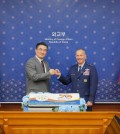 Kim Jun-pyo (L), director general for North American affairs at Seoul's foreign ministry, greets Lt. Gen. Scott Pleus, deputy commander of the U.S. Forces Korea, with a fist bump, during the 204th ROK-U.S. Joint Committee of the Status of Forces Agreement, at the Ministry of Foreign Affairs in Seoul, on Nov. 20, 2023, in this photo provided by the ministry. ROK stands for the Republic of Korea, South Korea's official name. (PHOTO NOT FOR SALE) (Yonhap)