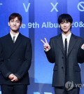 K-pop duo TVXQ! poses for photographers during a press conference to promote its ninth studio album, "20&2," in Seoul on Dec. 26, 2023. (Yonhap)