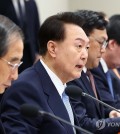 President Yoon Suk Yeol (2nd from L) presides over a Cabinet meeting at the presidential office in Seoul on Dec. 19, 2023. (Pool photo) (Yonhap)