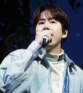 Super Junior member Kyuhyun performs during a media showcase for his new EP, "Restart," in Seoul on Jan. 9, 2024. (Yonhap)