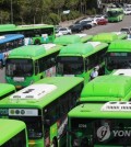 A file photo of city buses in Seoul (Yonhap)