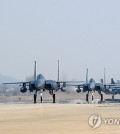 South Korean F-15Ks taxi on a runway at Osan Air Base in Pyeongtaek, 60 kilometers south of Seoul, in this file photo provided by the Air Force on March 4, 2024. (PHOTO NOT FOR SALE) (Yonhap)