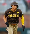 May 19, 2024; Atlanta, Georgia, USA; San Diego Padres shortstop Ha-Seong Kim (7) runs to third against the Atlanta Braves in the second inning at Truist Park. Mandatory Credit: Brett Davis-USA TODAY Sports