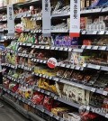 Customers shop at a major discount chain store in Seoul on May 26, 2024. (Yonhap)