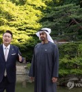 President Yoon Suk Yeol (L) and United Arab Emirates President Mohamed bin Zayed Al Nahyan walk inside Changdeok Palace in Seoul on May 28, 2024, in this photo provided by the presidential office. (PHOTO NOT FOR SALE) (Yonhap)