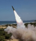 A missile is launched, as North Korea conducted a test firing of a tactical ballistic missile on Friday,
