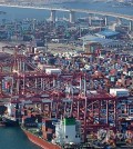 This file photo from Nov. 1, 2023, shows a port in Busan, 320 kilometers southeast of Seoul, packed with shipping containers. (Yonhap)