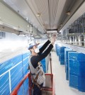 This undated file photo provided by LS Cable & System Ltd. shows a worker installing busduct products in a facility. (PHOTO NOT FOR SALE) (Yonhap)