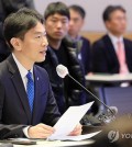 The file photo, taken March 13, 2024, shows Lee Bok-hyun, chief of the Financial Supervisory Service, speaking at a meeting with investors in Seoul to discuss ways to improve the country's stock short selling system. (Yonhap)