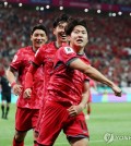 Lee Kang-in of South Korea (front) celebrates after scoring against China during the teams' Group C match in the second round of the Asian World Cup qualification at Seoul World Cup Stadium in Seoul on June 11, 2024. (Yonhap)