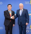South Korean Defense Minister Shin Won-sik (L) and his Romanian counterpart, Angel Tilvar, shake hands during their meeting in Romania on June 19, 2024, in this photo provided by Shin's office. (PHOTO NOT FOR SALE) (Yonhap)