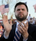 U.S. Senate Republican candidate J.D. Vance, who was endorsed by former U.S. President Donald Trump for the upcoming primary elections, applauds during an event hosted by Trump, at the county fairgrounds in Delaware, Ohio, U.S., April 23, 2022. REUTERS