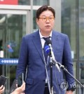 Former Ssangbangwool Group Chairman Kim Seong-tae speaks to reporters on July 12, 2024, in front of the Suwon District Court. (Yonhap)